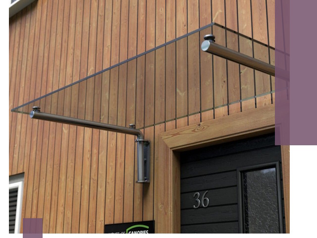 Стеклянные козырьки на входы и фасады в Екатеринбурге